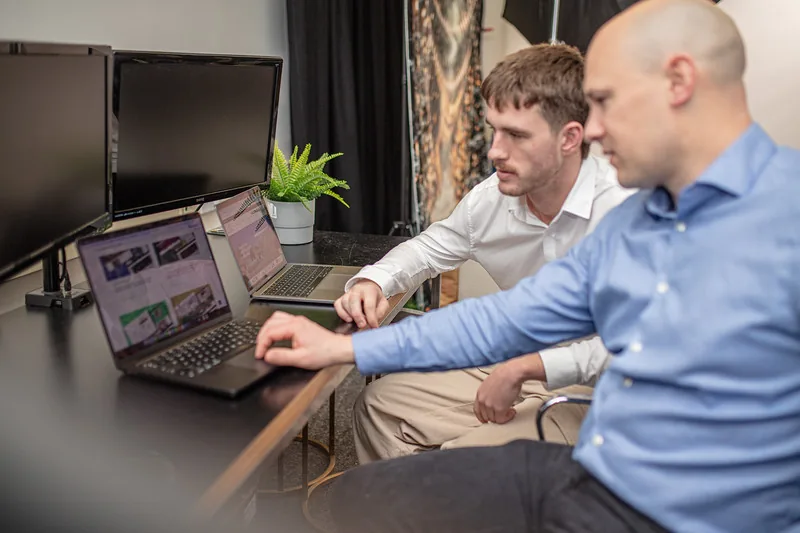 Luke and David from Halizona at their desks, working through a client’s marketing
